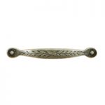 Brass drawer handle with leaf pattern.